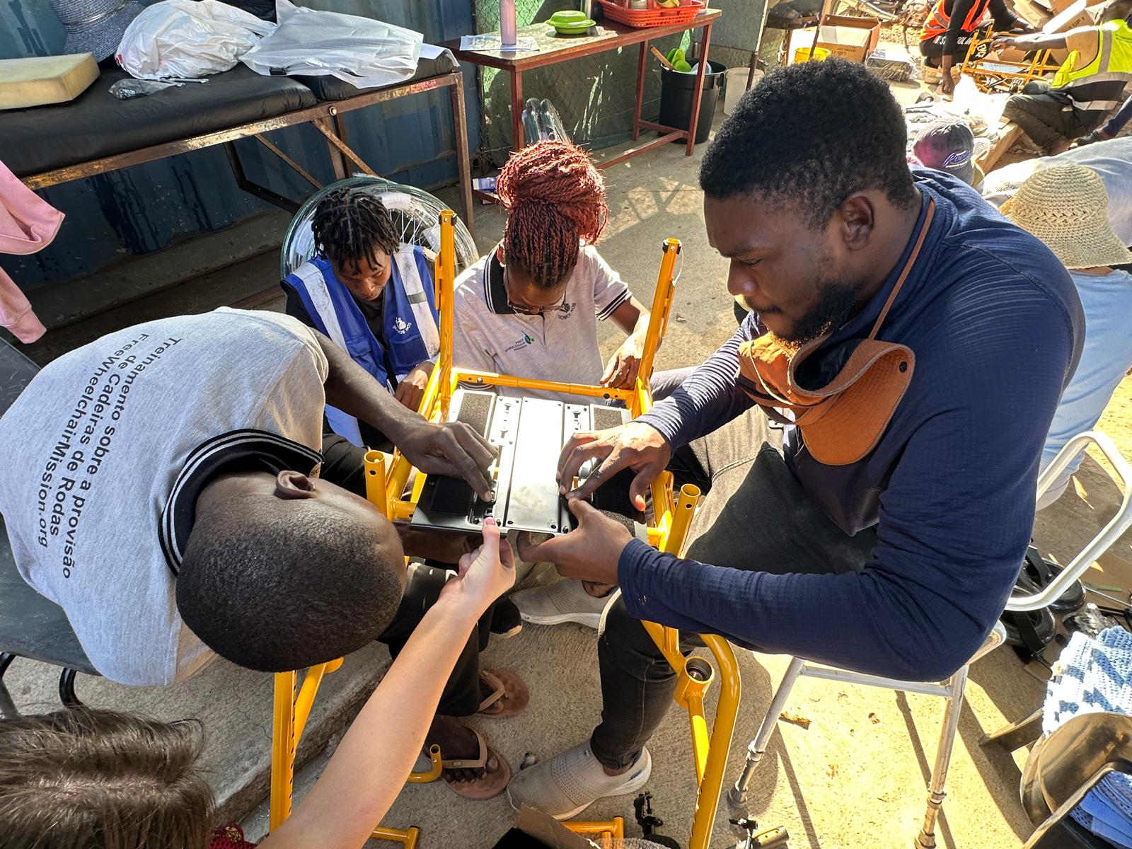 Teamwork as we learn to build the new specilaized wheelchairs